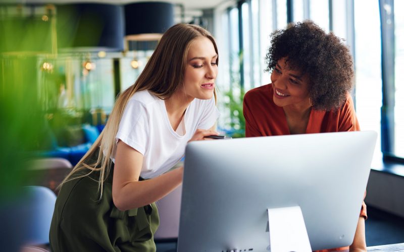 Businesswoman listening attentively coworker speech